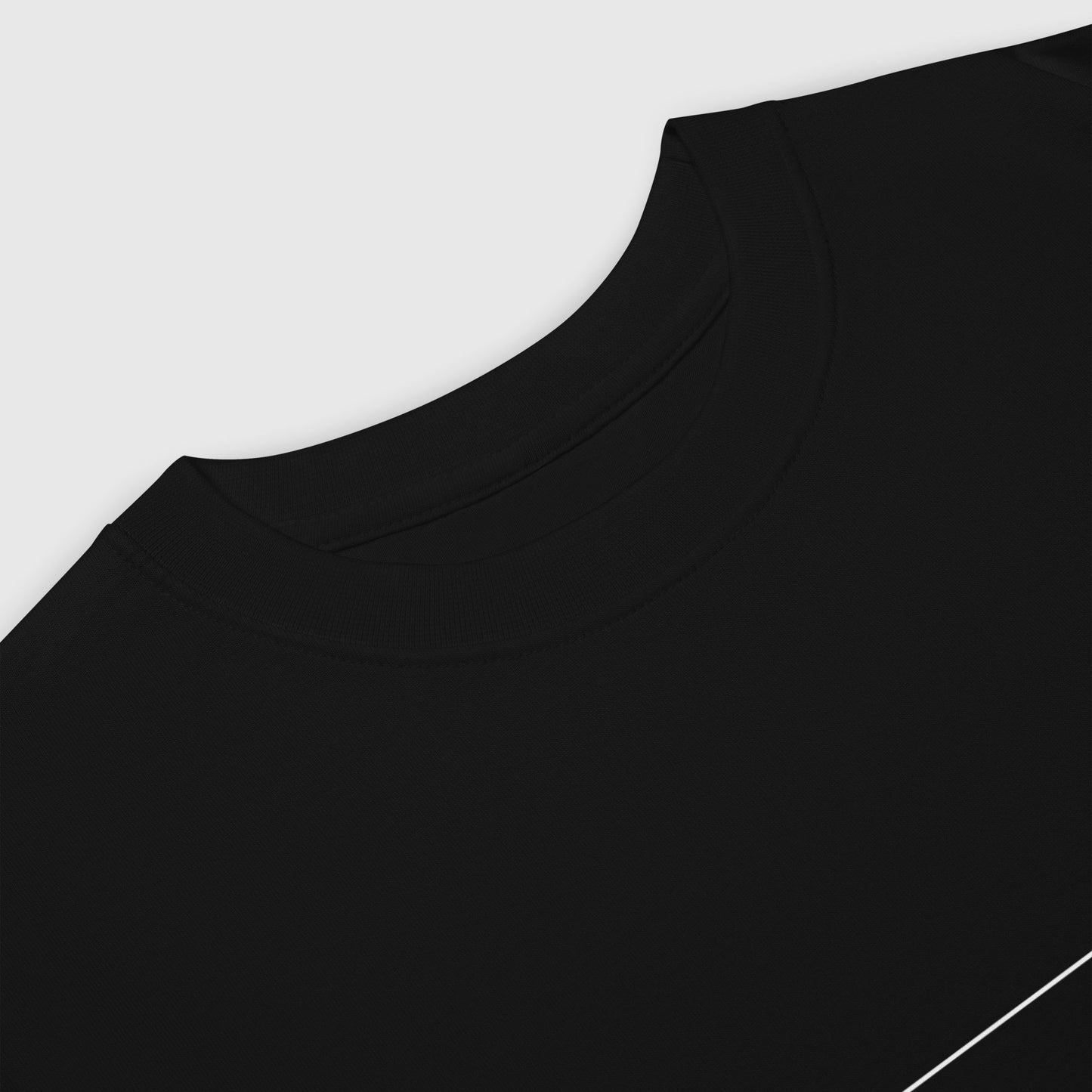 close up of the round neck of a black t shirt