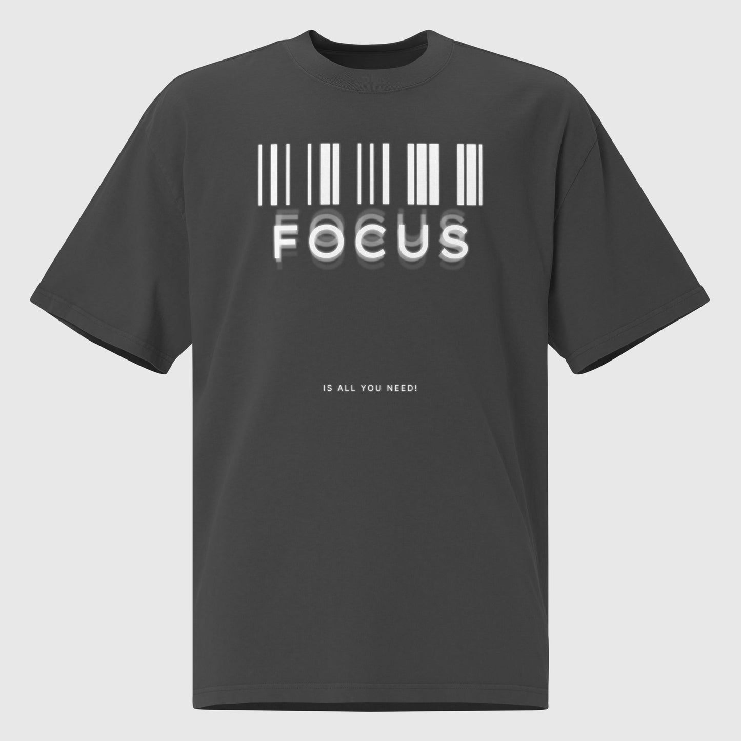 printed graphic oversized shirt in faded black colour with print saying, "focus is all you need"