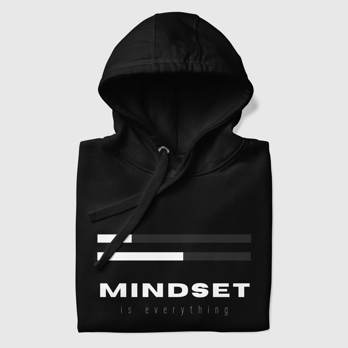 folded black hoodie that says, "Mindset is everything"