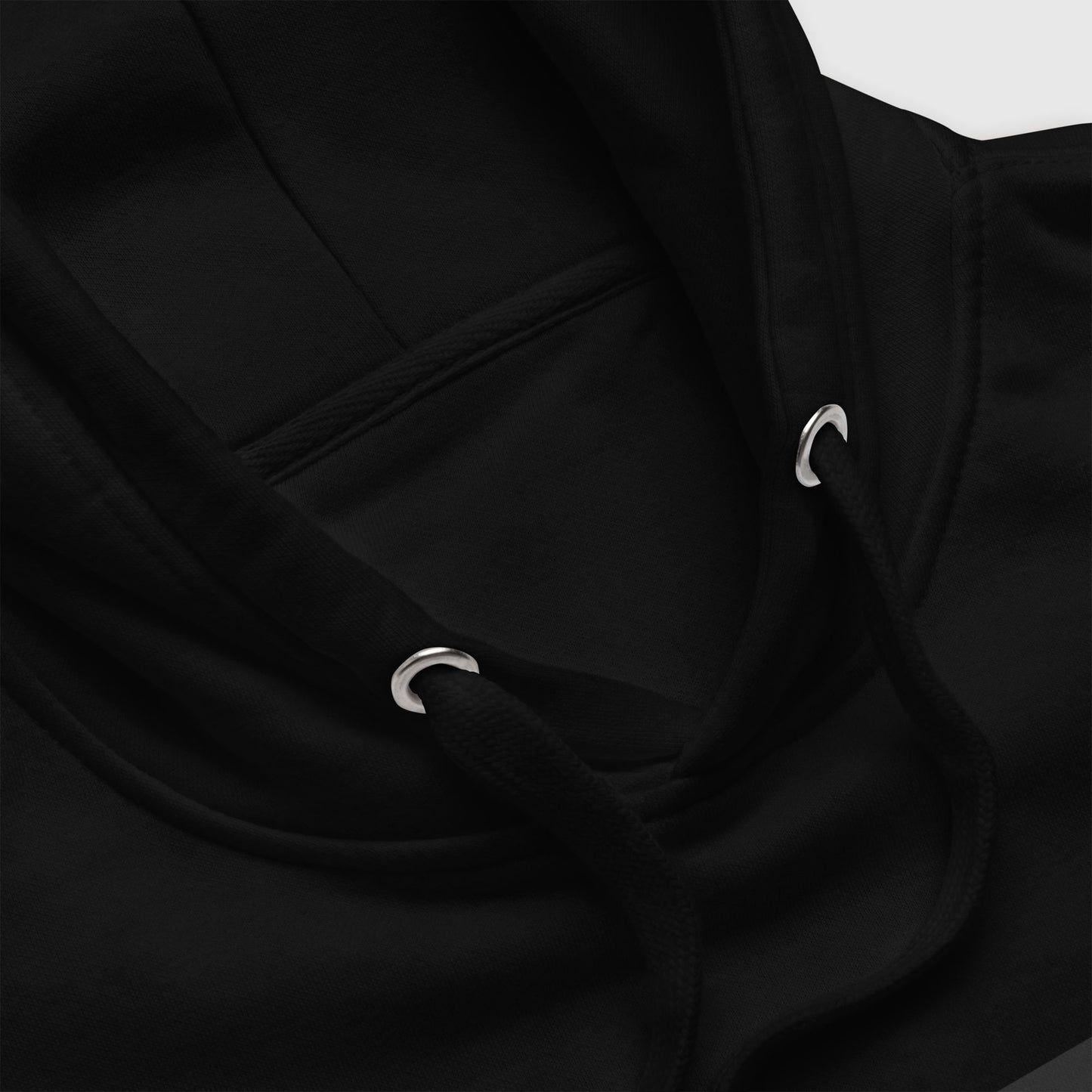 drawstrings of a black hoodie