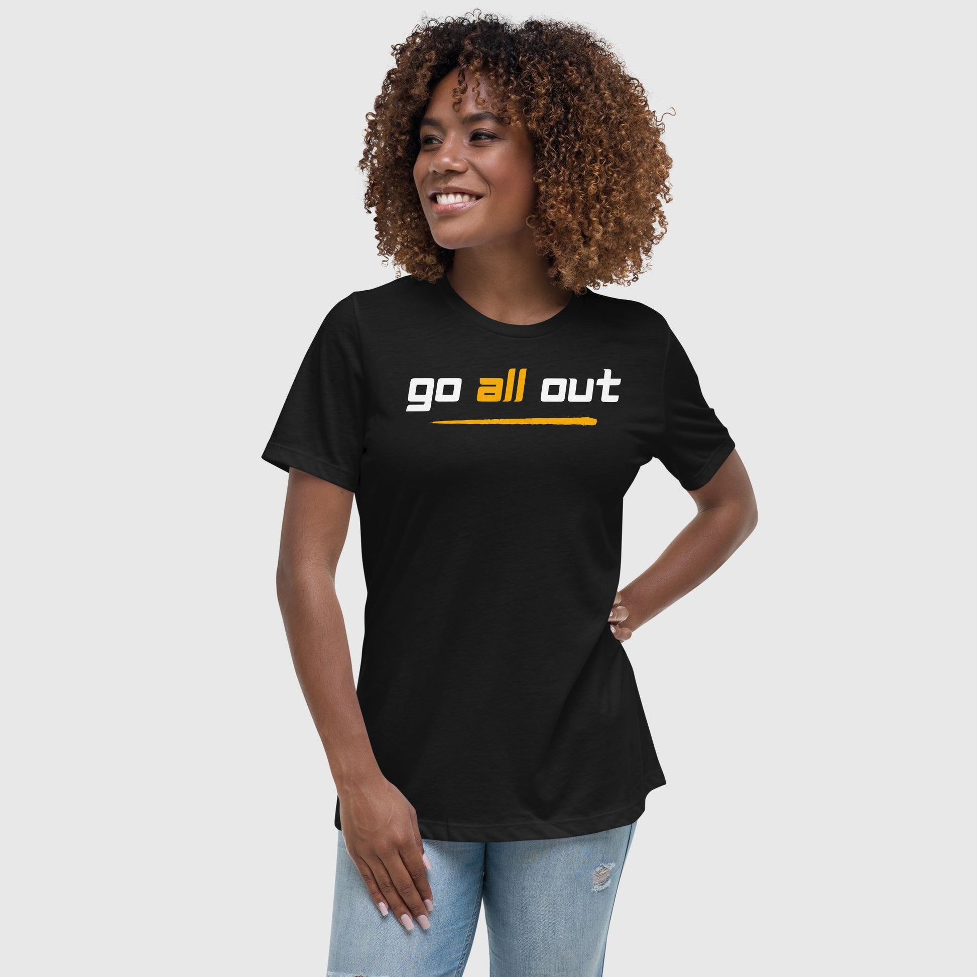 women smiling wearing 'go all out' printed black t shirt